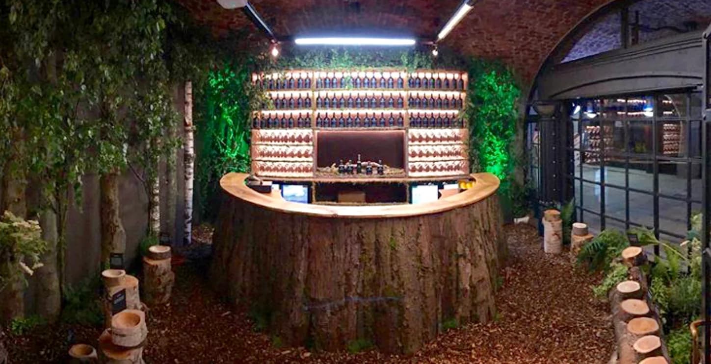 installed stump bar, lit bottle wall